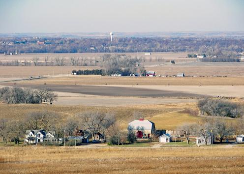 Farmland with town in background