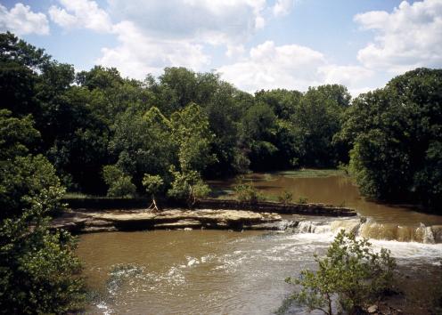 waterfall over sandstone ledge