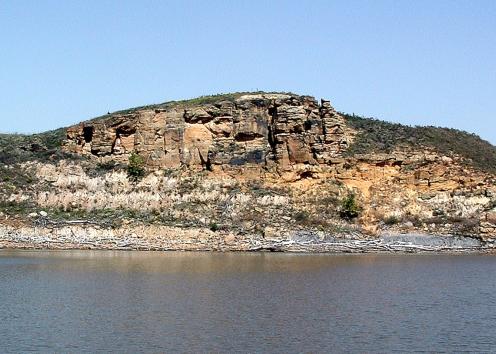 Sandstone formation across lake