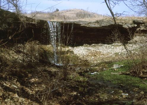 Waterfall over limestone ledge