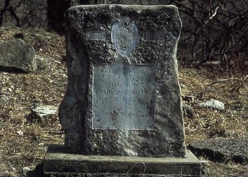 Gravestone inscribed "God in his love and charity has called in this beautiful valley a pioneer mother, May 29, 1846"