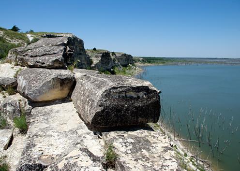 Limestone blocks at the edge of the reservoir